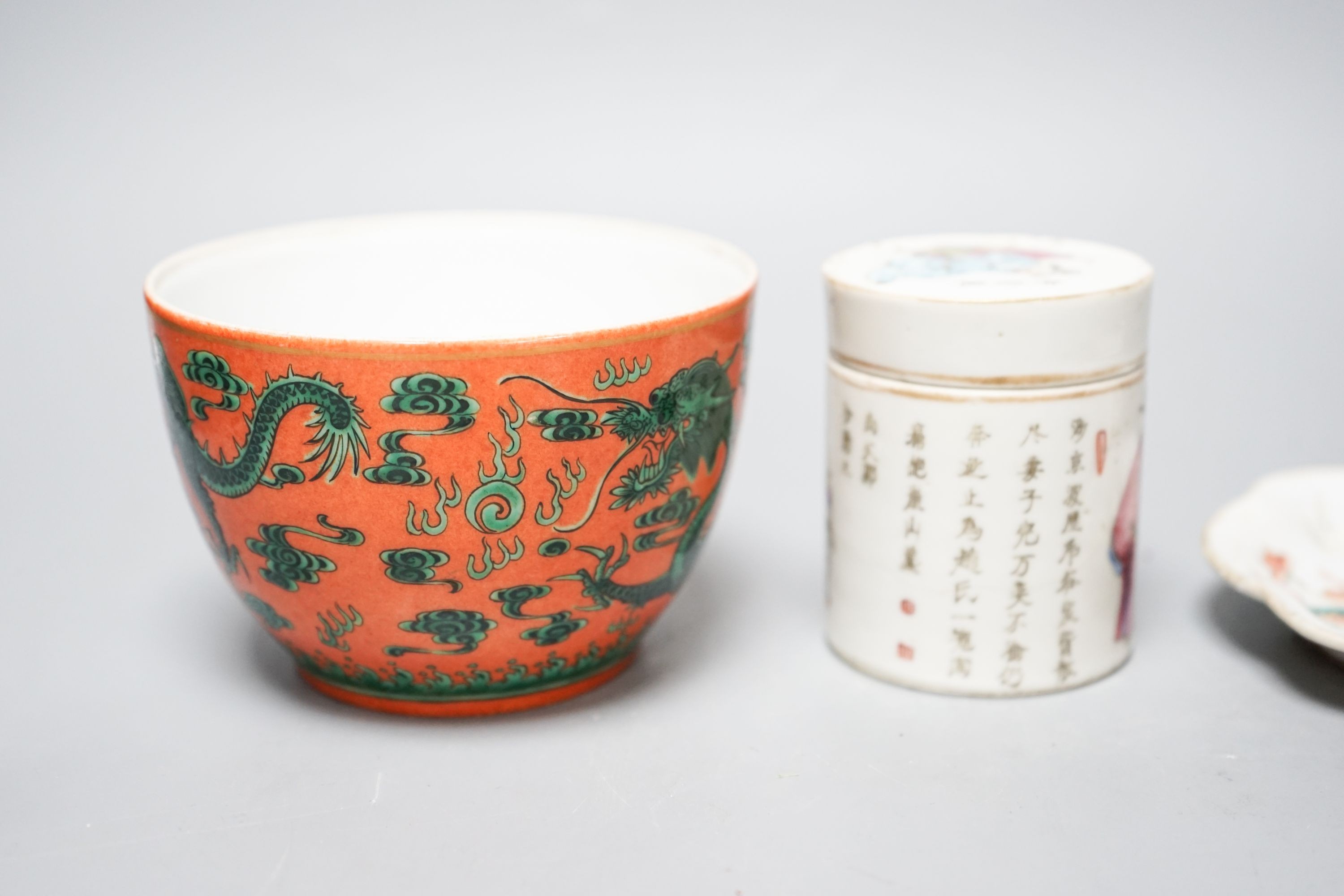 A Chinese orange ground dragon bowl, 11cm a famille rose box and cover and a similar pair of dishes, 19th century and later